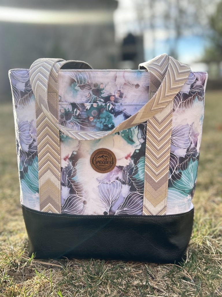 Tote with fairy floral print and chevron straps